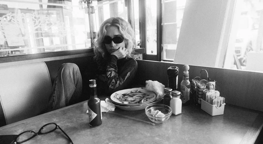 Blondshell wearing sunglasses