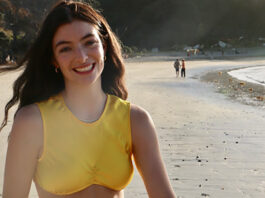 Lorde on a beach in video for Solar Power